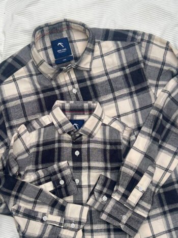 Cream and navy blue tartan plaid flannel shirt