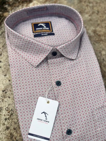 Dusty pink with red tiny dots